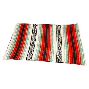 Mexican Baja blanket mat in mint, white, burnt-orange and black striped design.